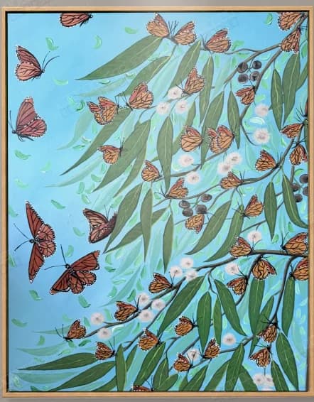 Butterflies among long green leaves