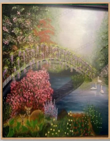 Painted garden bridge over a still pond, banked with pink blossom