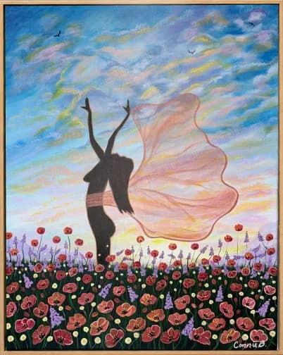 Silhouetted dancer in a poppy field beneath a sunset sky