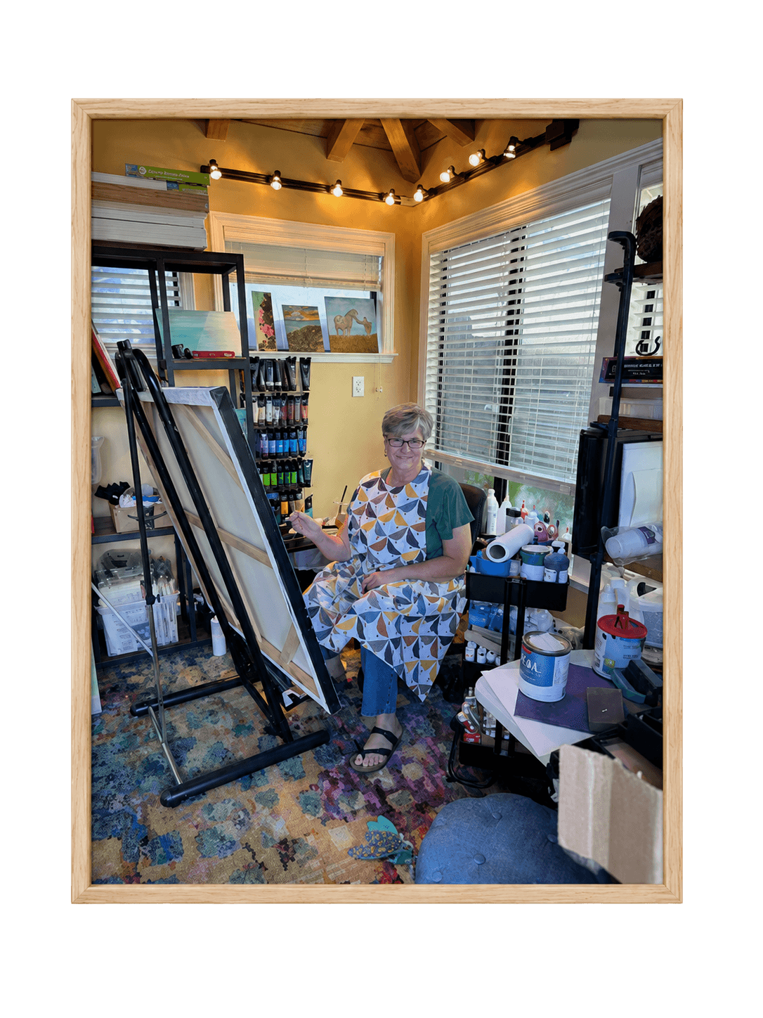 Connie's studio, with finished paintings and materials in view