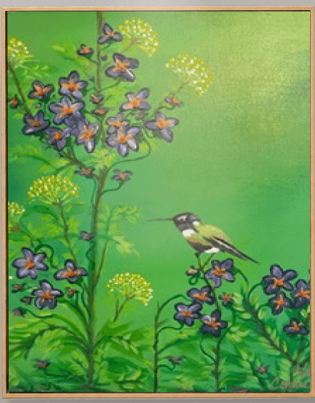 Small bird among pink blossom and green foliage