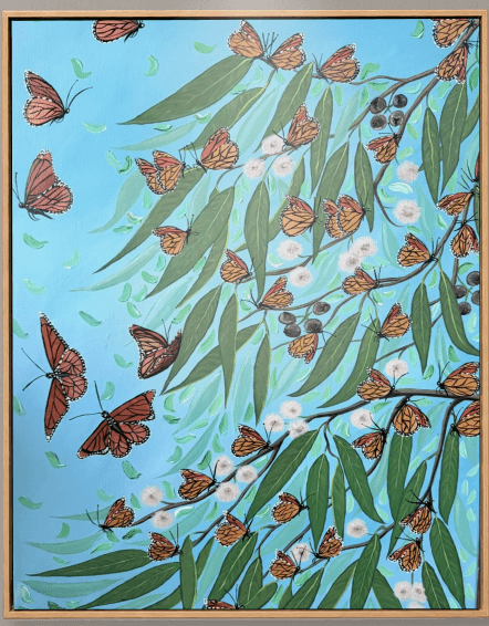 Butterflies among long green leaves