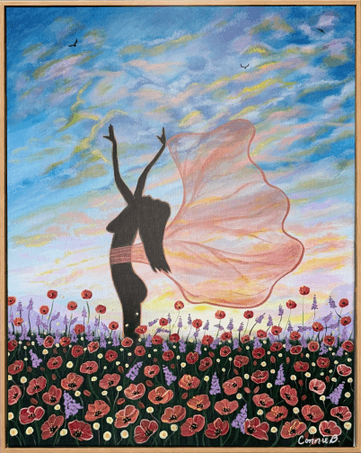 Silhouetted dancer in a poppy field beneath a sunset sky